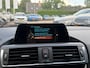 BMW 2-Serie Cabrio 220i Luxury / Trekhaak / Half Leder / Navigatie / Parkeerhulp achter / 17'' / Stoelverwarming / Windscherm / Cruise Control