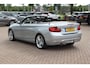 BMW 2-Serie Cabrio 220i Luxury / Trekhaak / Half Leder / Navigatie / Parkeerhulp achter / 17'' / Stoelverwarming / Windscherm / Cruise Control