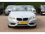 BMW 2-Serie Cabrio 220i Luxury / Trekhaak / Half Leder / Navigatie / Parkeerhulp achter / 17'' / Stoelverwarming / Windscherm / Cruise Control