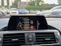 BMW 2-Serie Cabrio 220i Luxury / Trekhaak / Half Leder / Navigatie / Parkeerhulp achter / 17'' / Stoelverwarming / Windscherm / Cruise Control