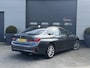 BMW 3-Serie 320i xDrive High Executive Edition | Navigatie | Head-Up Display | DAB | Privacy Glass | Lederen Bekleding |
