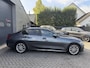BMW 3-Serie 320i xDrive High Executive Edition | Navigatie | Head-Up Display | DAB | Privacy Glass | Lederen Bekleding |