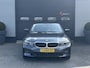 BMW 3-Serie 320i xDrive High Executive Edition | Navigatie | Head-Up Display | DAB | Privacy Glass | Lederen Bekleding |