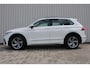 Volkswagen Tiguan 1.4 TSI eHybrid R-Line Business+ | Incl. 12 maanden garantie | SOH 92% | Stoel/stuurverwarming | Parkeercamera | Wegklapbare trekhaak | DAB radio | Apple carplay/Android auto | 100% dealer onderhouden |