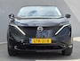 Nissan Ariya Advance 91 kWh / SOH 99% / Fabrieksgarantie tot 12-2027 / CCS snelladen / warmtepomp / Stuur- Stoel & Voorruitverwarming / Apple Carplay Android Auto / Adaptief cruise control / Keyless Enty/Start / Elektrische achterklep /