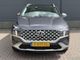 Hyundai Santa Fe 1.6 T-GDI PHEV Premium Sky 7p. / Dealer Onderhouden / Trekhaak / 1350KG Trekgewicht /  Elektrische Stoelen met Geheugen / Schuif Kantel Dak / Keyless / Elektrische Achterklep