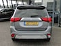 Mitsubishi Outlander 2.4 Phev 4wd Instyle | Schuifdak | Leer | All-season | Trekhaak | Adaptief