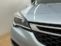 Opel Astra Sports Tourer Occasion 1.4 Innovation | Grijs | Tweedehands Opel Astra | Airco | Cruise | Trekhaak | Bluetooth | Navi