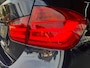 BMW 3-Serie 320i High Executive | Leer | Open dak