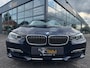 BMW 3-Serie 320i High Executive | Leer | Open dak