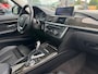 BMW 3-Serie 320i High Executive | Leer | Open dak