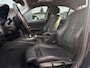 BMW 3-Serie 320i High Executive | Leer | Open dak