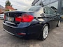 BMW 3-Serie 320i High Executive | Leer | Open dak