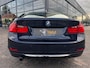 BMW 3-Serie 320i High Executive | Leer | Open dak