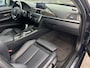 BMW 3-Serie 320i High Executive | Leer | Open dak