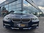 BMW 3-Serie 320i High Executive | Leer | Open dak