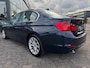 BMW 3-Serie 320i High Executive | Leer | Open dak