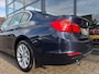 BMW 3-Serie 320i High Executive | Leer | Open dak