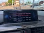 BMW 3-Serie 320i High Executive | Leer | Open dak