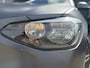BMW 1-Serie 114i - Stoelverwarming - Lichtmetalen velgen - Airconditioning