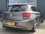 BMW 1-Serie 114i - Stoelverwarming - Lichtmetalen velgen - Airconditioning