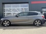 BMW 1-Serie 114i - Stoelverwarming - Lichtmetalen velgen - Airconditioning
