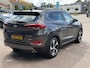 Hyundai Tucson 1.6 T-GDi Premium 4WD LEDER | KEYLESS ENTRY/G | AUTOMAAT | AWD | CAMERA | ELEKTRISCH VERSTELBARE STOELEN | STOELVERWARMING | STUURVERWARMING | STUURKOELING | PANORAMADAK | NAVIGATIE | LED | XENON KOPLAMPEN | APPLE CARPLAY / ANDROID AUTO | CRUISECONTROL |