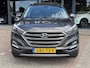 Hyundai Tucson 1.6 T-GDi Premium 4WD LEDER | KEYLESS ENTRY/G | AUTOMAAT | AWD | CAMERA | ELEKTRISCH VERSTELBARE STOELEN | STOELVERWARMING | STUURVERWARMING | STUURKOELING | PANORAMADAK | NAVIGATIE | LED | XENON KOPLAMPEN | APPLE CARPLAY / ANDROID AUTO | CRUISECONTROL |