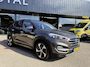 Hyundai Tucson 1.6 T-GDi Premium 4WD LEDER | KEYLESS ENTRY/G | AUTOMAAT | AWD | CAMERA | ELEKTRISCH VERSTELBARE STOELEN | STOELVERWARMING | STUURVERWARMING | STUURKOELING | PANORAMADAK | NAVIGATIE | LED | XENON KOPLAMPEN | APPLE CARPLAY / ANDROID AUTO | CRUISECONTROL |
