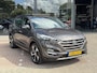Hyundai Tucson 1.6 T-GDi Premium 4WD LEDER | KEYLESS ENTRY/G | AUTOMAAT | AWD | CAMERA | ELEKTRISCH VERSTELBARE STOELEN | STOELVERWARMING | STUURVERWARMING | STUURKOELING | PANORAMADAK | NAVIGATIE | LED | XENON KOPLAMPEN | APPLE CARPLAY / ANDROID AUTO | CRUISECONTROL |