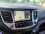 Hyundai Tucson 1.6 T-GDi Premium 4WD LEDER | KEYLESS ENTRY/G | AUTOMAAT | AWD | CAMERA | ELEKTRISCH VERSTELBARE STOELEN | STOELVERWARMING | STUURVERWARMING | STUURKOELING | PANORAMADAK | NAVIGATIE | LED | XENON KOPLAMPEN | APPLE CARPLAY / ANDROID AUTO | CRUISECONTROL |