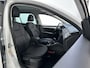 Skoda Octavia Combi 1.5 TSI 150pk DSG Greentech Business Edition Leder-Stof Trekhaak Stoelverwarming Navigatie App-Connect DAB+