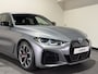BMW i4 M50 84 kWh M Sport Pro | SOH 97,6% | el. Schuif/kanteldak | el. stoelen met memory | HUD | Unieke kleur