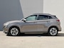 Hyundai Kona Electric EV Fashion 64 kWh / 3 fase laden / SOH 100% / Fabrieksgarantie accu t/m 07-2030 / Dealer Onderhouden / Stuur-/Stoelverwarming / Navigatie / Apple Carplay/Android Auto / Achteruitrijcamera /