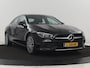 Mercedes-Benz CLA 180 Business Solution Luxury | Leder | Stoelverwarming | Cruise control | Sfeerverlichting | Navigatie | Bluetooth | Camera | Park assist | Climate control