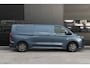 Ford E-Transit Custom 340 L2H1 Limited 218pk - 2x Schuif - LED - 360 Camera - B&O - ACC - Navi - Stoel/Stuurverwarming - Rijklaar