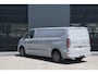 Ford E-Transit Custom 340 L2H1 Limited 71 kWh 218pk - 2x Schuifdeur - AGR Bestuurdersstoel - ACC - B&O - Navi - Stoel/Stuurverwarming - 360 Camera - Blindspot - Rijklaar