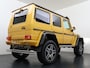 Mercedes-Benz G-klasse 500 4x4² | Schuif- / Kanteldak | Memory Seats | Stoelverwarming Voor + Achter | Solarbeam Yellow Metallic | Achteruitrij Camera | Bi-Xenon Koplampen