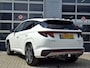 Hyundai Tucson 1.6 T-GDI HEV N Line Sky | Navigatie/Android/Apple Carplay | LMV 19" | Elektrisch Glazen Panoramadak | Adaptieve Cruise Control | Voorstoelen/Achterbank Verwarmd | Rondomzichtcamera | Airco Automatisch |