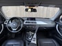 BMW 3-Serie 320i Upgrade Edition | M-SPORT VELGEN | LEDER | TREKHAAK | GOED ONDERHOUDEN