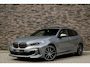 BMW 1-Serie M135i xDrive | Live Cockpit | Panorama | Leder | Memory | H&K | Head-Up | Camera | 19"LM | Skyscraper Grey