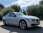 BMW 3-Serie 320i High Executive Automaat / 2e Eigenaar / Bi-Xenon / 18" Velgen / Navi / Clima / Dealer Onderhouden / PDC / Cruise