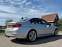 BMW 3-Serie 320i High Executive Automaat / 2e Eigenaar / Bi-Xenon / 18" Velgen / Navi / Clima / Dealer Onderhouden / PDC / Cruise