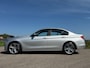 BMW 3-Serie 320i High Executive Automaat / 2e Eigenaar / Bi-Xenon / 18" Velgen / Navi / Clima / Dealer Onderhouden / PDC / Cruise