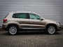 Volkswagen Tiguan 1.4 TSI Sport&Style | Clima | Cruise | Navi | Leer | Panoramadak | Trekhaak | Xenon | Pdc voor/achter | Camera |  Allseason