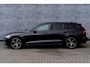 Volvo V60 2.0 T6 Recharge AWD R-Design | Plug-in Hybrid (PHEV) | Trekhaak | Harman Kardon Audio | Achteruitrijcamera | Parkeersensoren | Keyless Entry | Elektrische Achterklep | Elektrisch Verstelbare Voorstoelen | Stoelverwarming | LED Koplampen Adaptief | Navigatie | Apple Carplay | Android Auto