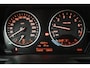 BMW 2-Serie Gran Tourer 220i High Executive (PANORAMADAK, STOELVERWARMING, TREKHAAK, CAMERA)