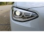 BMW 1-Serie 114i EDE Executive | Cruise controle | Parkeersensoren | Keyless start | Climate controle | Apple CarPlay/Android Auto | Angel eye LED Koplampen | 17 Inch Monaco velgen | Getinte ramen | Maxton design spoilers | Navigatie | Origineel NL Auto | NAP |