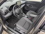 Toyota Yaris Cross 1.5 Hybrid 115 First Edition BRONZE MET. STOEL- STUUR- EN RUITENWISSER VERWARMING DRAADLOOS LADEN