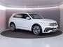 Volkswagen Tiguan 1.4 TSI eHybrid R-Line Business 245 pk Automaat (DSG) | Private lease vanaf €766 | Navigatie | Panoramadak | Park assist | Rondomzicht camera | Head-up display | Lederen bekleding | Elektr. voorstoelen met geheugen | R-Line |
